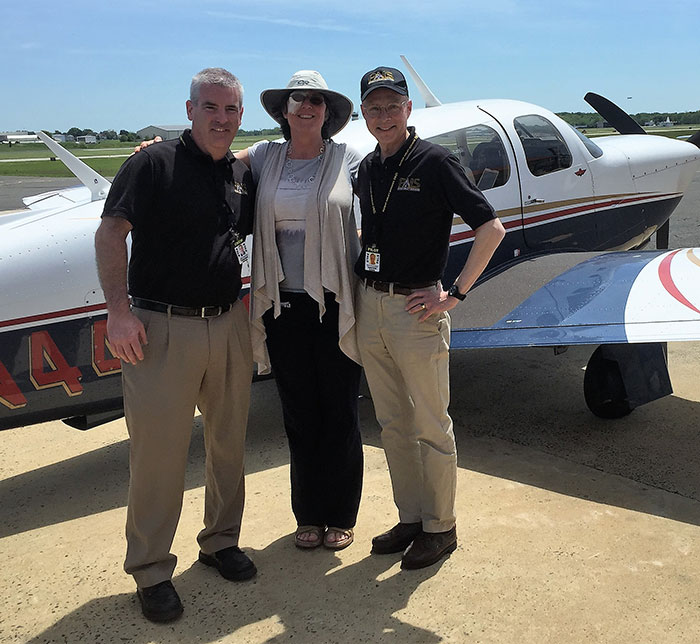 Robert Statius-Muller (right), passenger Sheri (center) and AutoPilot, Mark Timmerman (left)